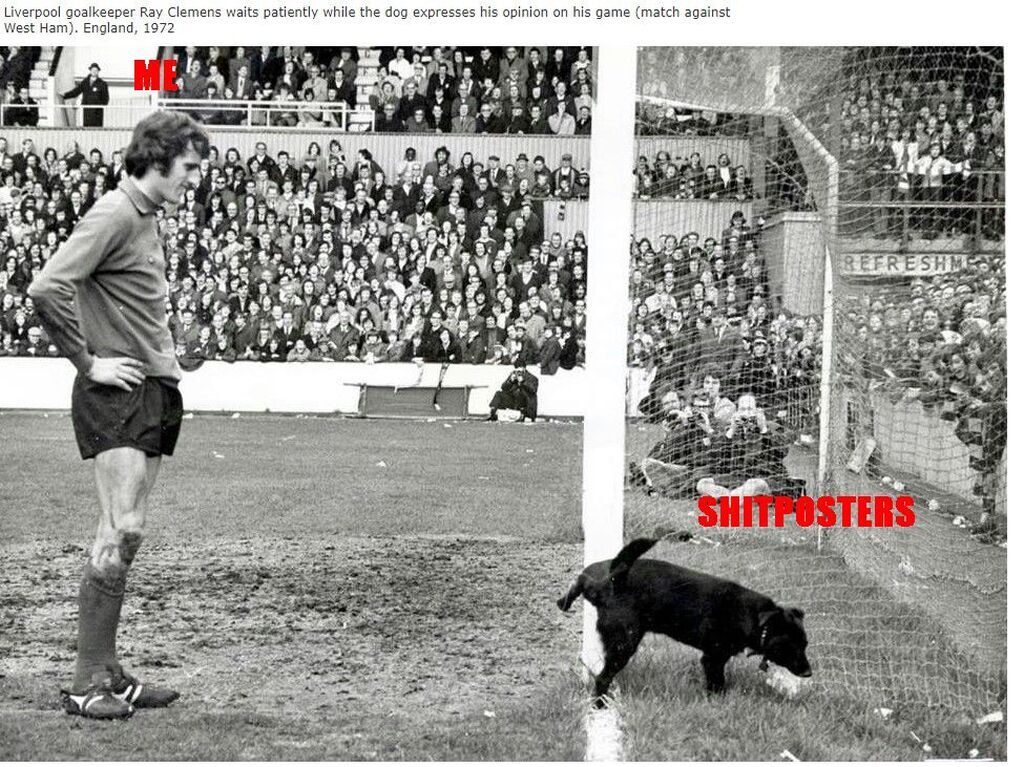 AI caption: a man is standing next to a dog in a field, black and white