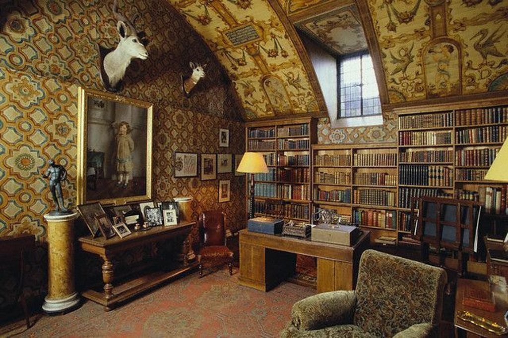 AI caption: a room with a large ornate ceiling and a desk, ornate