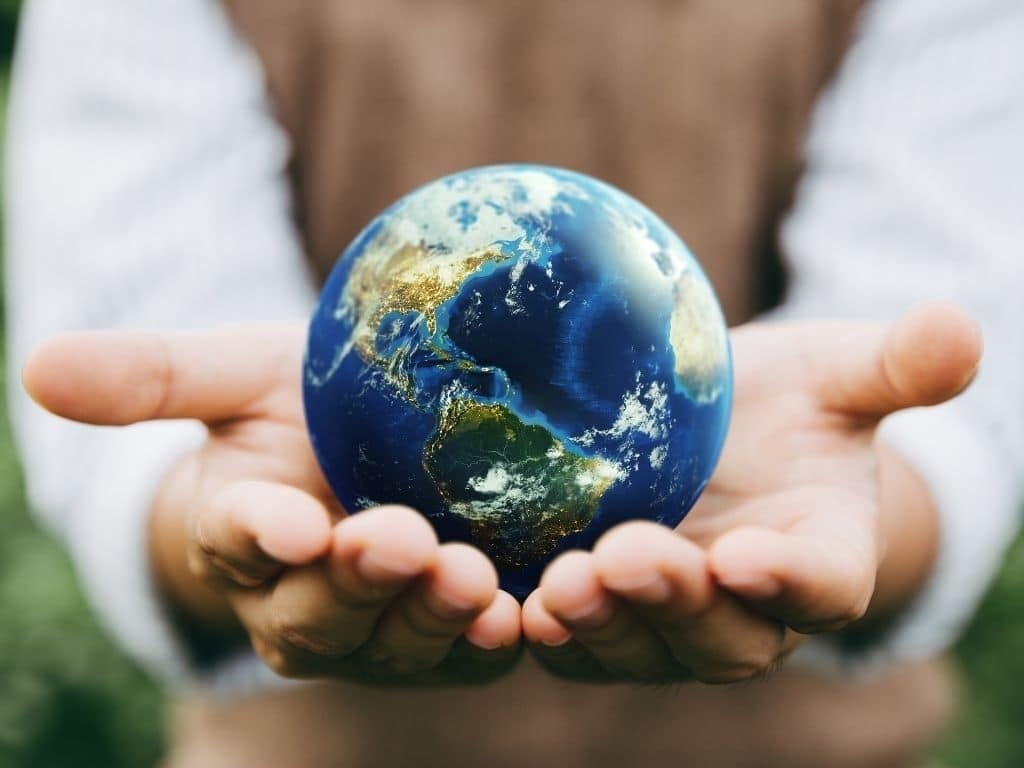 AI caption: a man holding a globe in his hands, abstract