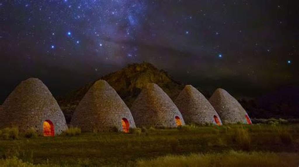 AI caption: the huts are lit up by the stars, black and white