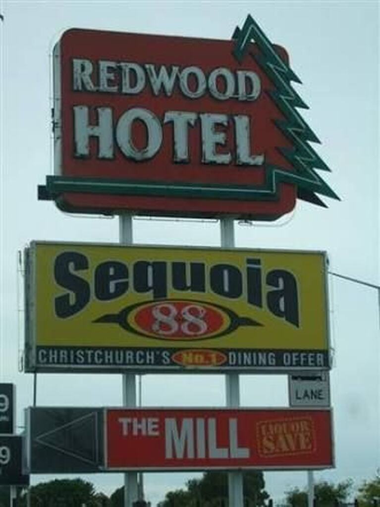 AI caption: redwood hotel sequoia 86 the mill, a sign