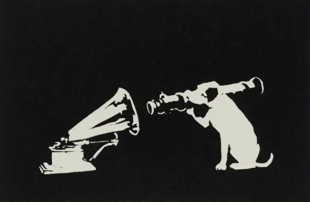 AI caption: a dog is looking at a gramophone, black and white